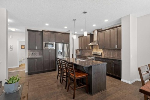 20 Mount Rae Terrace, Okotoks, AB - Indoor Photo Showing Kitchen With Upgraded Kitchen