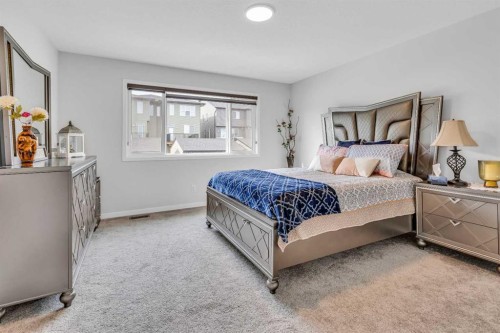 312 Edith Place Nw, Calgary, AB - Indoor Photo Showing Bedroom