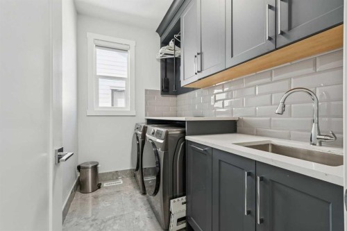 19 Duhram Way, Rural Rocky View County, AB - Indoor Photo Showing Laundry Room