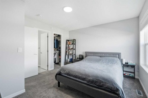 49 Lucas Grove Nw, Calgary, AB - Indoor Photo Showing Bedroom