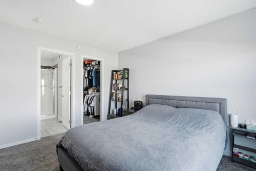 49 Lucas Grove Nw, Calgary, AB - Indoor Photo Showing Bedroom