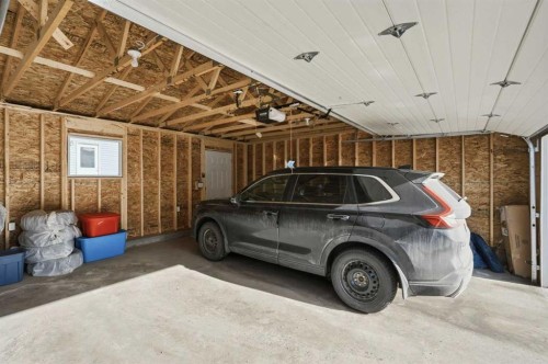49 Lucas Grove Nw, Calgary, AB - Indoor Photo Showing Garage