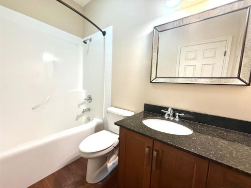 501 Sunvale Crescent Ne, High River, AB - Indoor Photo Showing Bathroom
