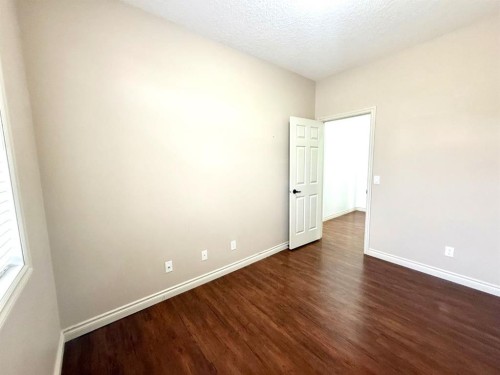 501 Sunvale Crescent Ne, High River, AB - Indoor Photo Showing Other Room