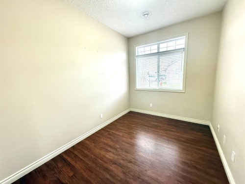 501 Sunvale Crescent Ne, High River, AB - Indoor Photo Showing Other Room