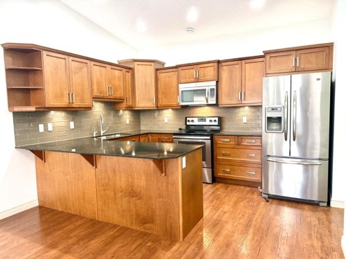501 Sunvale Crescent Ne, High River, AB - Indoor Photo Showing Kitchen