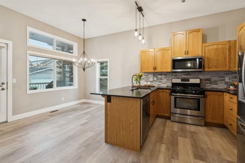 17 Prestwick Pond Terrace Se, Calgary, AB - Indoor Photo Showing Kitchen With Stainless Steel Kitchen