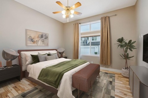 17 Prestwick Pond Terrace Se, Calgary, AB - Indoor Photo Showing Bedroom