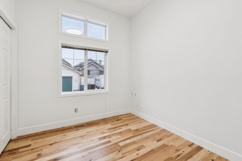 17 Prestwick Pond Terrace Se, Calgary, AB - Indoor Photo Showing Other Room