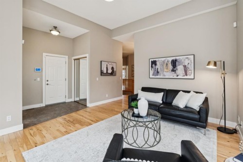 17 Prestwick Pond Terrace Se, Calgary, AB - Indoor Photo Showing Living Room
