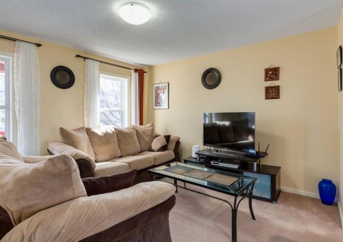 471 Silverado Plains Circle Sw, Calgary, AB - Indoor Photo Showing Living Room