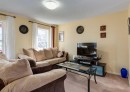 471 Silverado Plains Circle Sw, Calgary, AB  - Indoor Photo Showing Living Room 