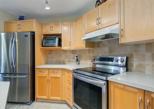 471 Silverado Plains Circle Sw, Calgary, AB - Indoor Photo Showing Kitchen