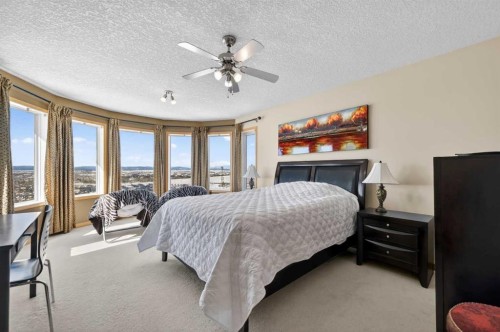 359 Rocky Ridge Drive Nw, Calgary, AB - Indoor Photo Showing Bedroom