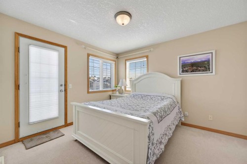 359 Rocky Ridge Drive Nw, Calgary, AB - Indoor Photo Showing Bedroom