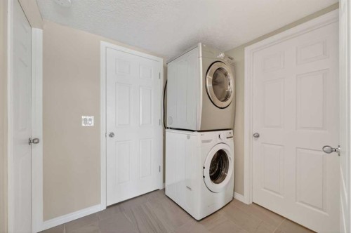 359 Rocky Ridge Drive Nw, Calgary, AB - Indoor Photo Showing Laundry Room