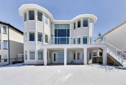 359 Rocky Ridge Drive Nw, Calgary, AB - Outdoor With Balcony With Facade