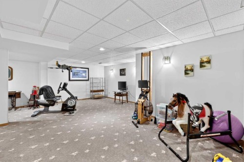 168 Templewood Drive Ne, Calgary, AB - Indoor Photo Showing Gym Room