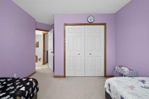 112 West Creek Close, Chestermere, AB - Indoor Photo Showing Bedroom