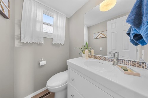 128 Allandale Close Se, Calgary, AB - Indoor Photo Showing Bathroom