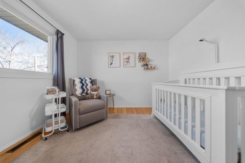 128 Allandale Close Se, Calgary, AB - Indoor Photo Showing Bedroom