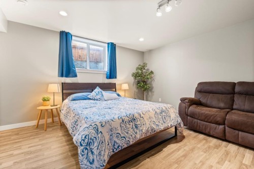 128 Allandale Close Se, Calgary, AB - Indoor Photo Showing Bedroom