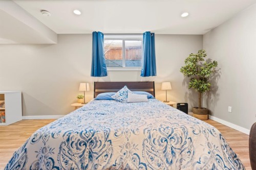 128 Allandale Close Se, Calgary, AB - Indoor Photo Showing Bedroom