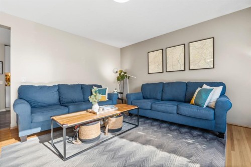 128 Allandale Close Se, Calgary, AB - Indoor Photo Showing Living Room