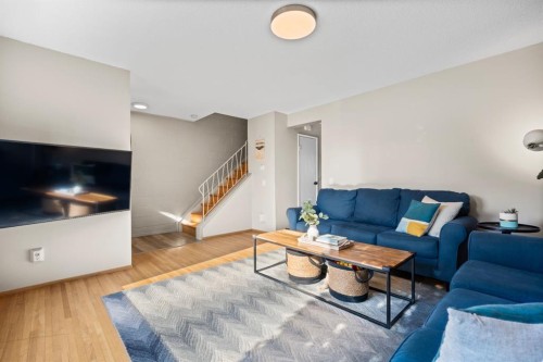 128 Allandale Close Se, Calgary, AB - Indoor Photo Showing Living Room