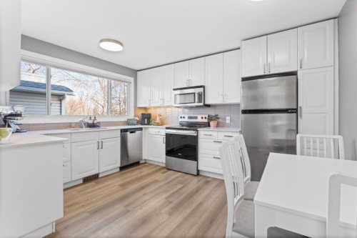 128 Allandale Close Se, Calgary, AB - Indoor Photo Showing Kitchen With Stainless Steel Kitchen