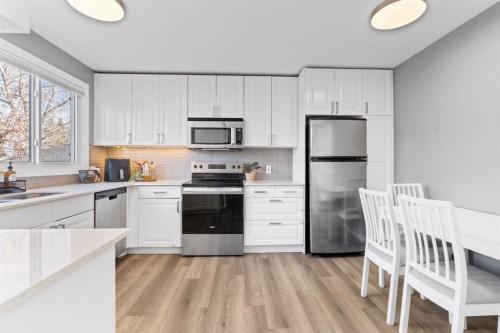 128 Allandale Close Se, Calgary, AB - Indoor Photo Showing Kitchen With Stainless Steel Kitchen