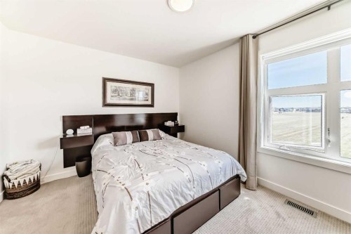 52 Walden Lane Se, Calgary, AB - Indoor Photo Showing Bedroom