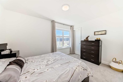 52 Walden Lane Se, Calgary, AB - Indoor Photo Showing Bedroom