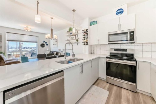 52 Walden Lane Se, Calgary, AB - Indoor Photo Showing Kitchen With Double Sink With Upgraded Kitchen