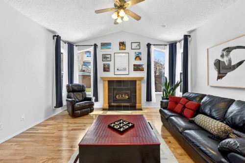 865 Citadel Way Nw, Calgary, AB - Indoor Photo Showing Living Room With Fireplace