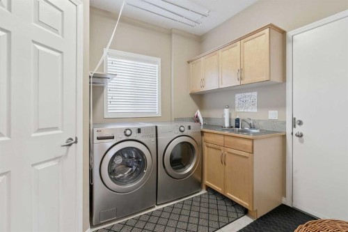 202 Tusslewood Terrace Nw, Calgary, AB - Indoor Photo Showing Laundry Room