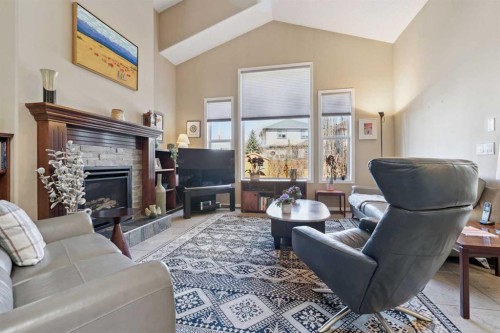 202 Tusslewood Terrace Nw, Calgary, AB - Indoor Photo Showing Living Room With Fireplace