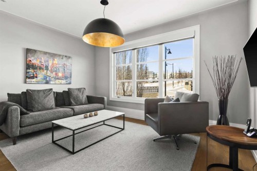 34 Elveden Heights Sw, Calgary, AB - Indoor Photo Showing Living Room