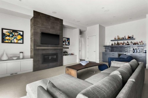 34 Elveden Heights Sw, Calgary, AB - Indoor Photo Showing Living Room With Fireplace