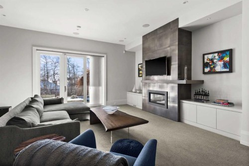 34 Elveden Heights Sw, Calgary, AB - Indoor Photo Showing Living Room With Fireplace