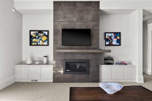34 Elveden Heights Sw, Calgary, AB - Indoor Photo Showing Living Room With Fireplace