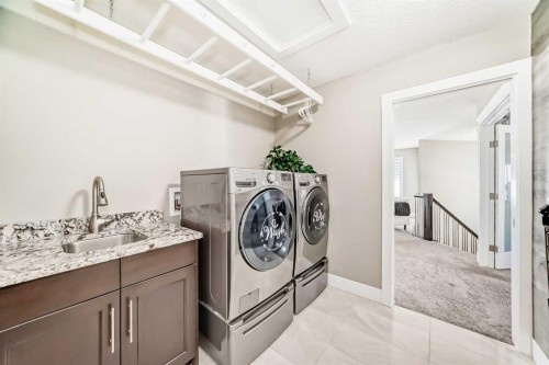 120 Kinniburgh Circle, Chestermere, AB - Indoor Photo Showing Laundry Room