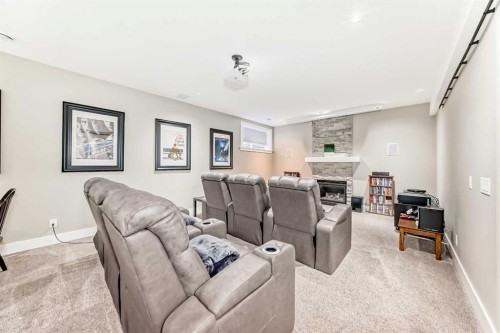 120 Kinniburgh Circle, Chestermere, AB - Indoor Photo Showing Living Room With Fireplace