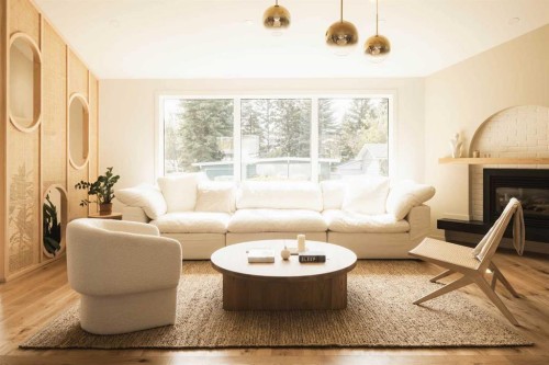 5036 Vanstone Crescent Nw, Calgary, AB - Indoor Photo Showing Living Room With Fireplace