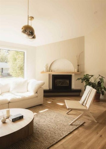 5036 Vanstone Crescent Nw, Calgary, AB - Indoor Photo Showing Living Room With Fireplace