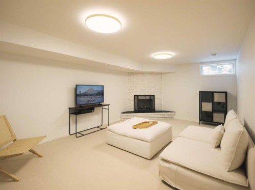 5036 Vanstone Crescent Nw, Calgary, AB - Indoor Photo Showing Other Room With Fireplace