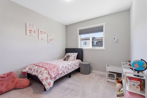 131 Walcrest Way Se, Calgary, AB - Indoor Photo Showing Bedroom