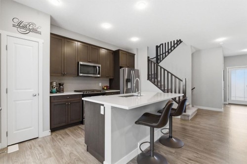 131 Walcrest Way Se, Calgary, AB - Indoor Photo Showing Kitchen With Stainless Steel Kitchen With Upgraded Kitchen
