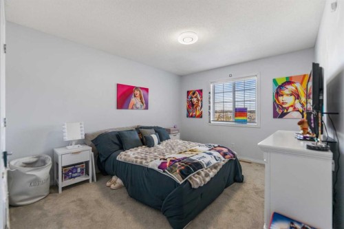 328 Rainbow  Falls Way, Chestermere, AB - Indoor Photo Showing Bedroom