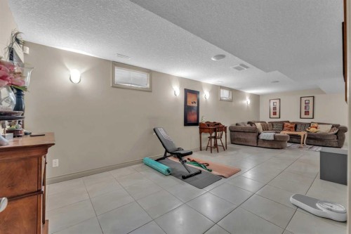 183 Westview Drive Sw, Calgary, AB - Indoor Photo Showing Gym Room